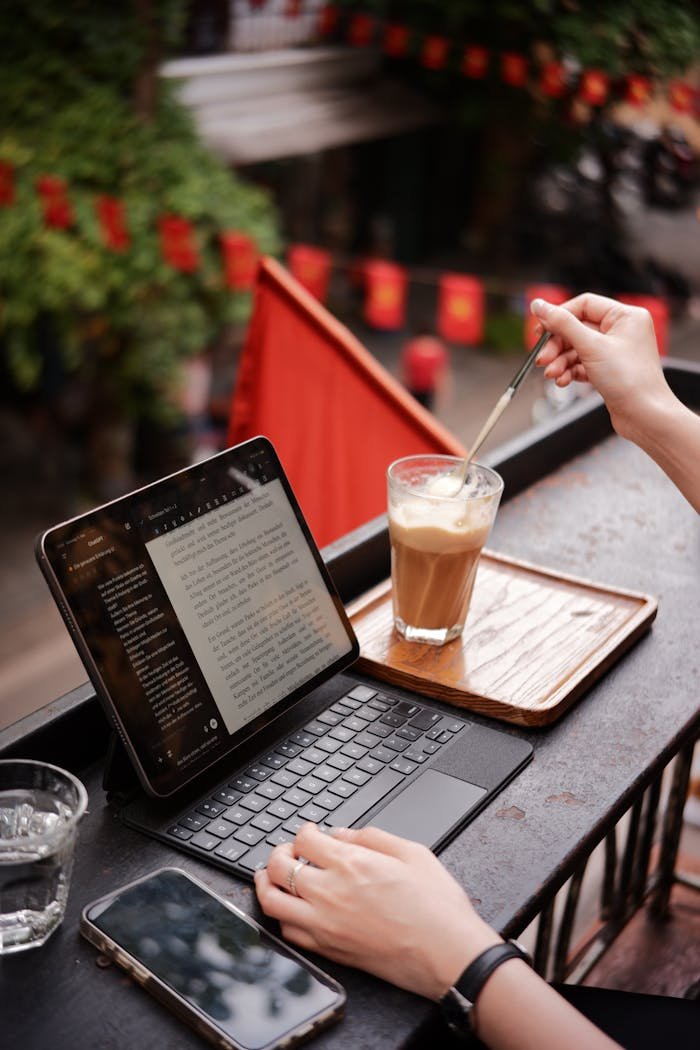 services-01 outdoor-cafe-workspace-with-tablet-and-coffee-34769799